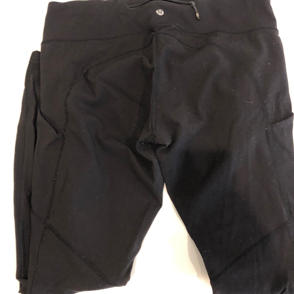 Lululemon - black - side pockets - some piling - still in decent shape!